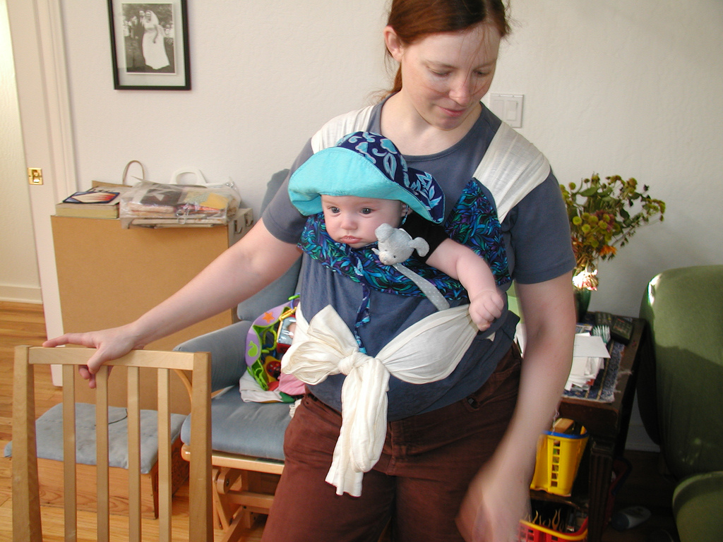 woman carrying baby